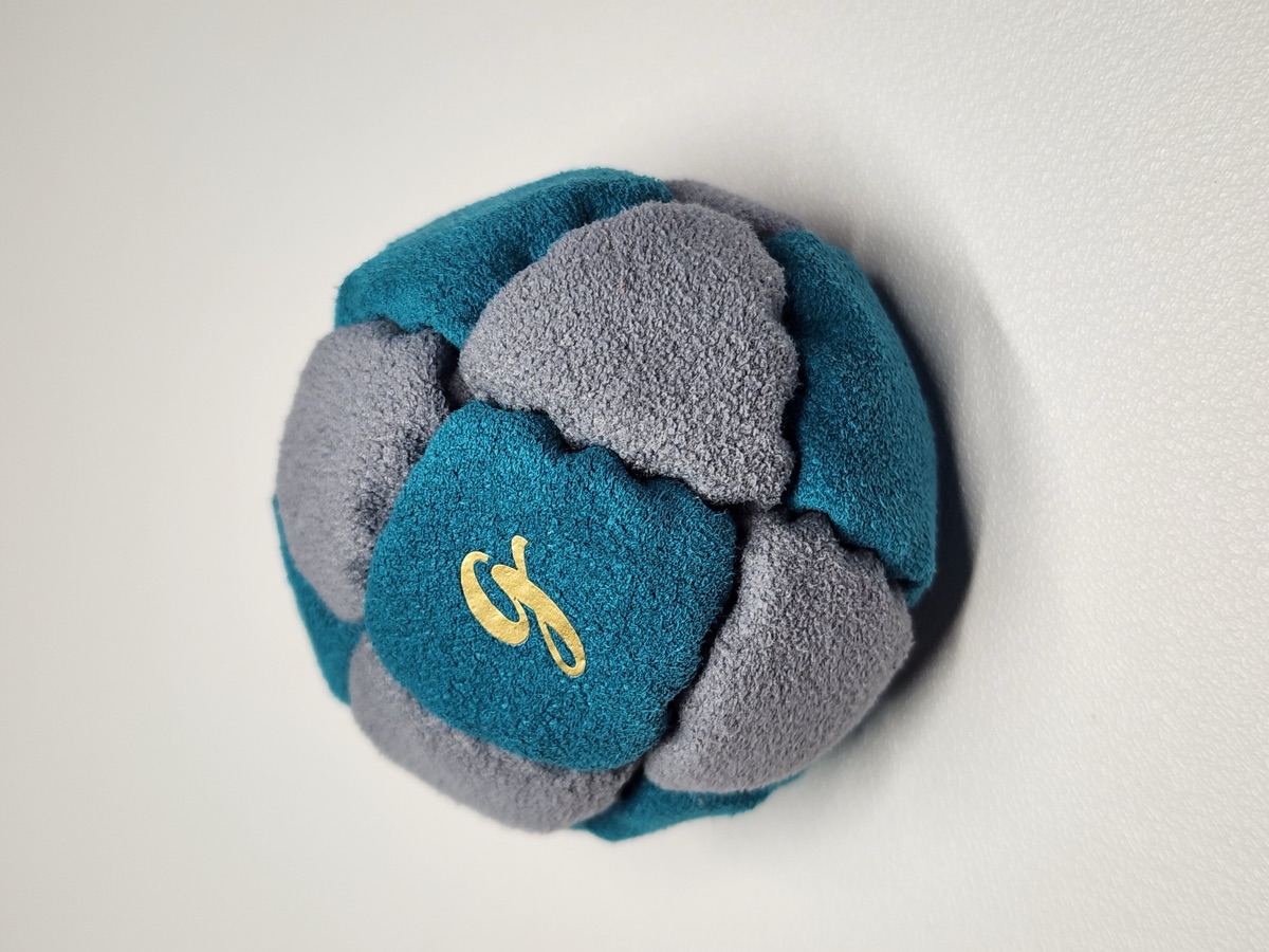14-Panel Footbag by G (#76) — Stitched by freestyle player G. A 14-panel pro freestyle bag made from a mix of Ultrasuede LT and LX — the gold standard fabrics for freestyle footbags. 14 panels, 2 inch, 65g.