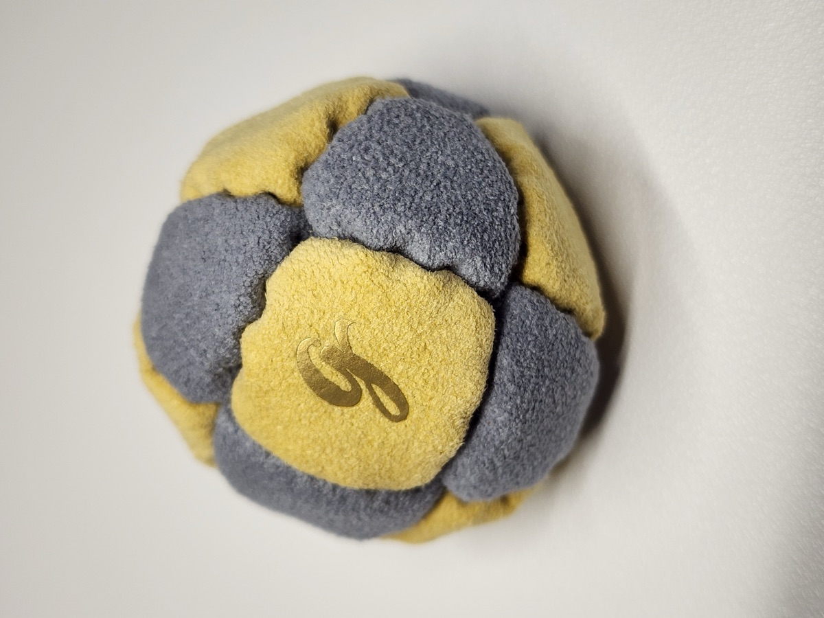 14-Panel Footbag by G (#77) — Stitched by freestyle player G. A 14-panel pro freestyle bag made from a mix of Ultrasuede LT and LX — the gold standard fabrics for freestyle footbags. 14 panels, 2 inch, 65g.