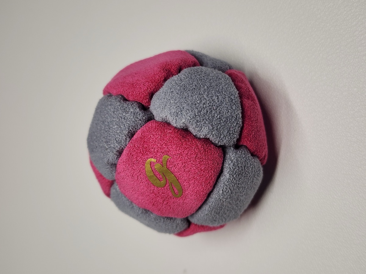 14-Panel Footbag by G (#78) — Stitched by freestyle player G. A 14-panel pro freestyle bag made from a mix of Ultrasuede LT and LX — the gold standard fabrics for freestyle footbags. 14 panels, 2 inch, 65g.