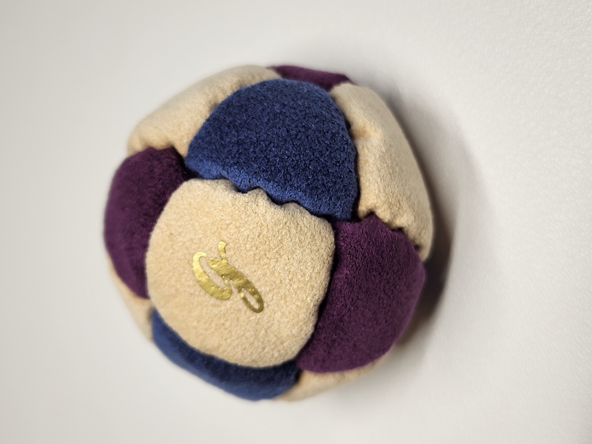 14-Panel Footbag by G (#79) — Stitched by freestyle player G. A 14-panel pro freestyle bag made from a mix of Ultrasuede LT and LX — the gold standard fabrics for freestyle footbags. 14 panels, 2 inch, 65g.