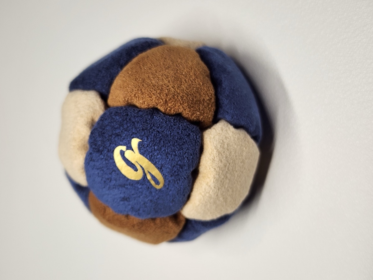 14-Panel Footbag by G (#80) — Stitched by freestyle player G. A 14-panel pro freestyle bag made from a mix of Ultrasuede LT and LX — the gold standard fabrics for freestyle footbags. 14 panels, 2 inch, 65g.