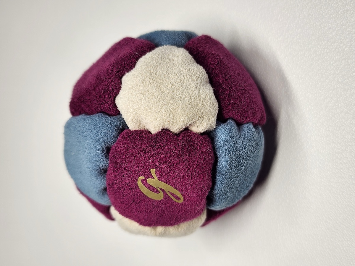 14-Panel Footbag by G (#75) — Stitched by freestyle player G. A 14-panel pro freestyle bag made from Ultrasuede LX — the gold standard fabric for freestyle footbags. 14 panels, 2 inch, 65g.