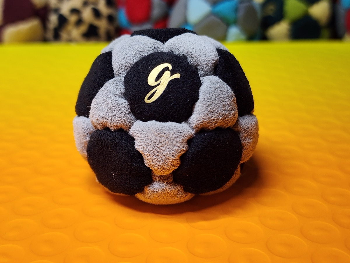 32-Panel Footbag by G (#102) — Stitched by freestyle player G. A 32-panel pro freestyle bag made entirely from Ultrasuede LX — the gold standard fabric for freestyle footbags. 32 panels, 1.9 inch, 65g.