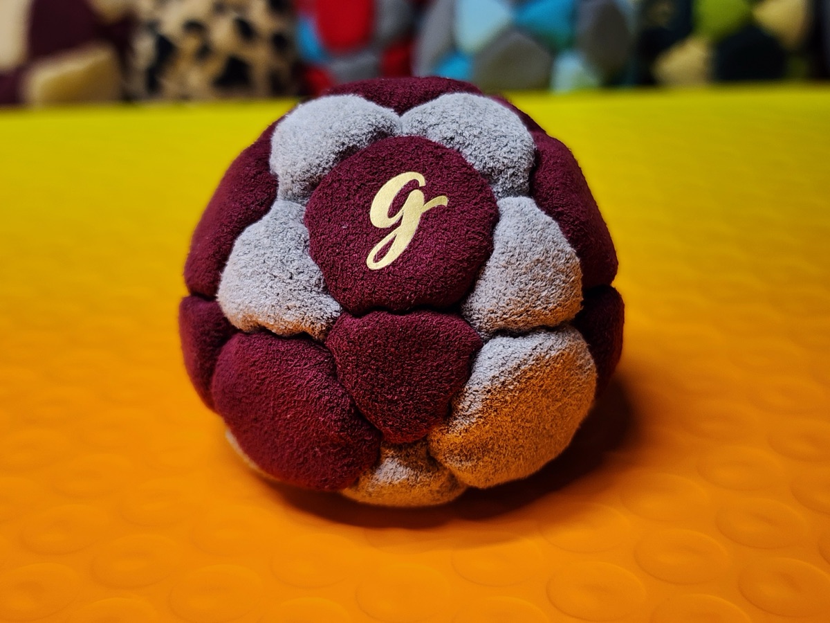 32-Panel Footbag by G (#96) — Stitched by freestyle player G. A 32-panel pro freestyle bag made entirely from Ultrasuede LX — the gold standard fabric for freestyle footbags. 32 panels, 1.9 inch, 65g.
