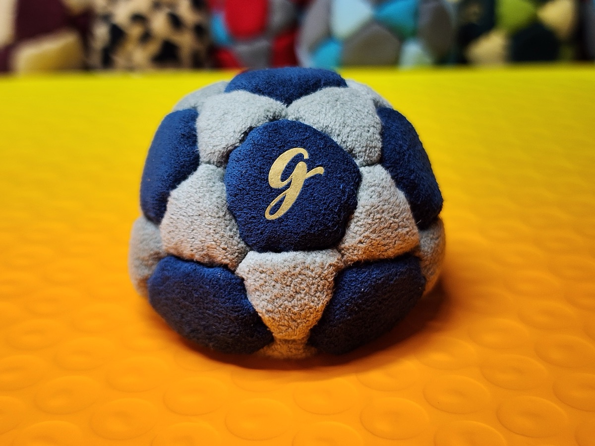 32-Panel Footbag by G (#94) — Stitched by freestyle player G. A 32-panel pro freestyle bag made from a mix of Ultrasuede LT and LX — the gold standard fabrics for freestyle footbags. 32 panels, 1.9 inch, 65g.