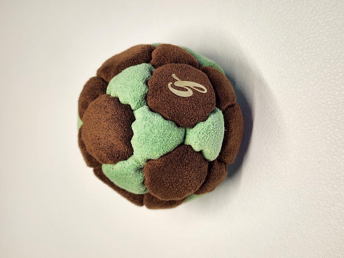 32-Panel Footbag by G (#61) — Stitched by freestyle player G. A 32-panel pro freestyle bag made from Ultrasuede LX — the gold standard fabric for freestyle footbags. 32 panels, 1.9 inch, 65g.