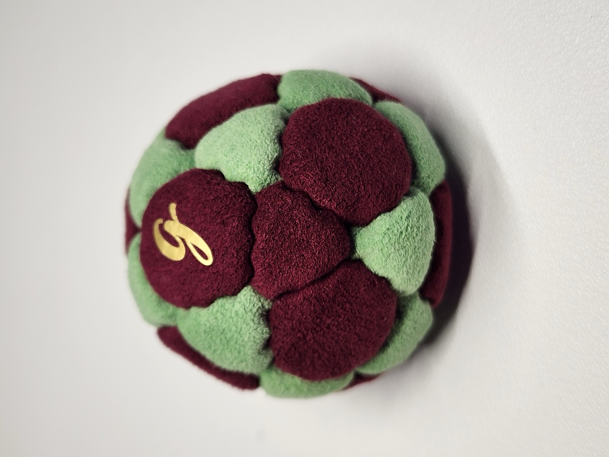 32-Panel Footbag by G (#63) — Stitched by freestyle player G. A 32-panel pro freestyle bag made from Ultrasuede LX — the gold standard fabric for freestyle footbags. 32 panels, 1.9 inch, 65g.