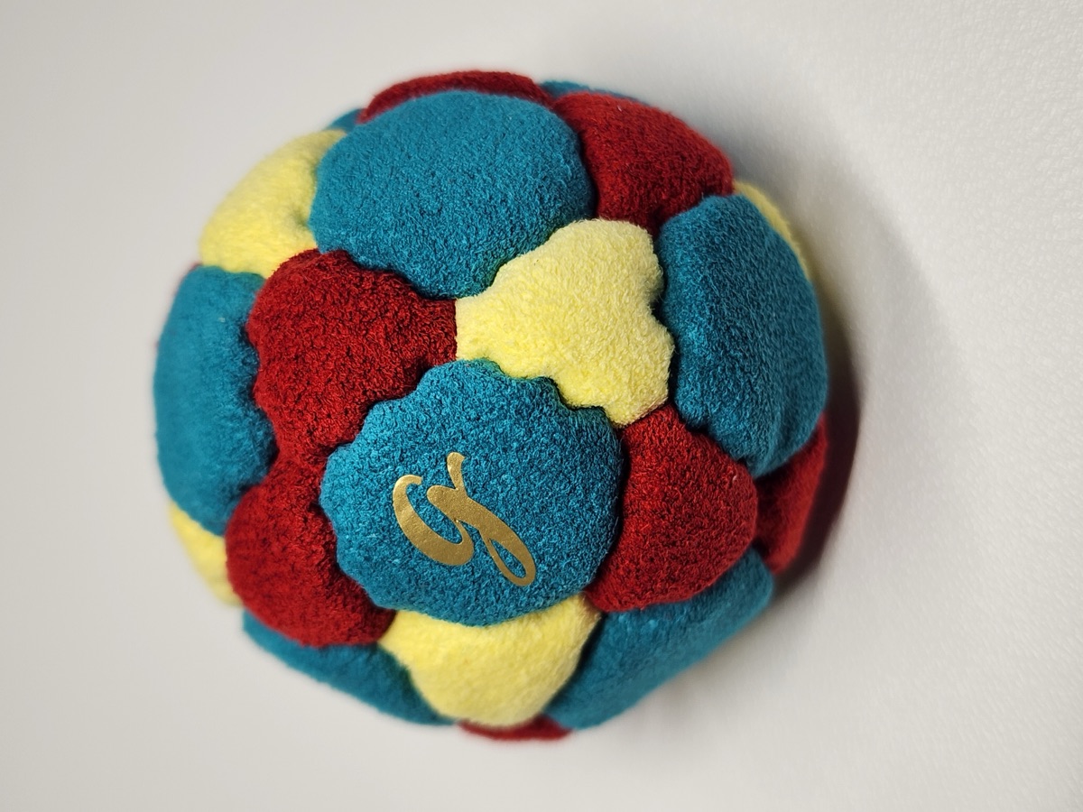 32-Panel Footbag by G (#65) — Stitched by freestyle player G. A 32-panel pro freestyle bag made from Ultrasuede LX — the gold standard fabric for freestyle footbags. 32 panels, 1.9 inch, 65g.