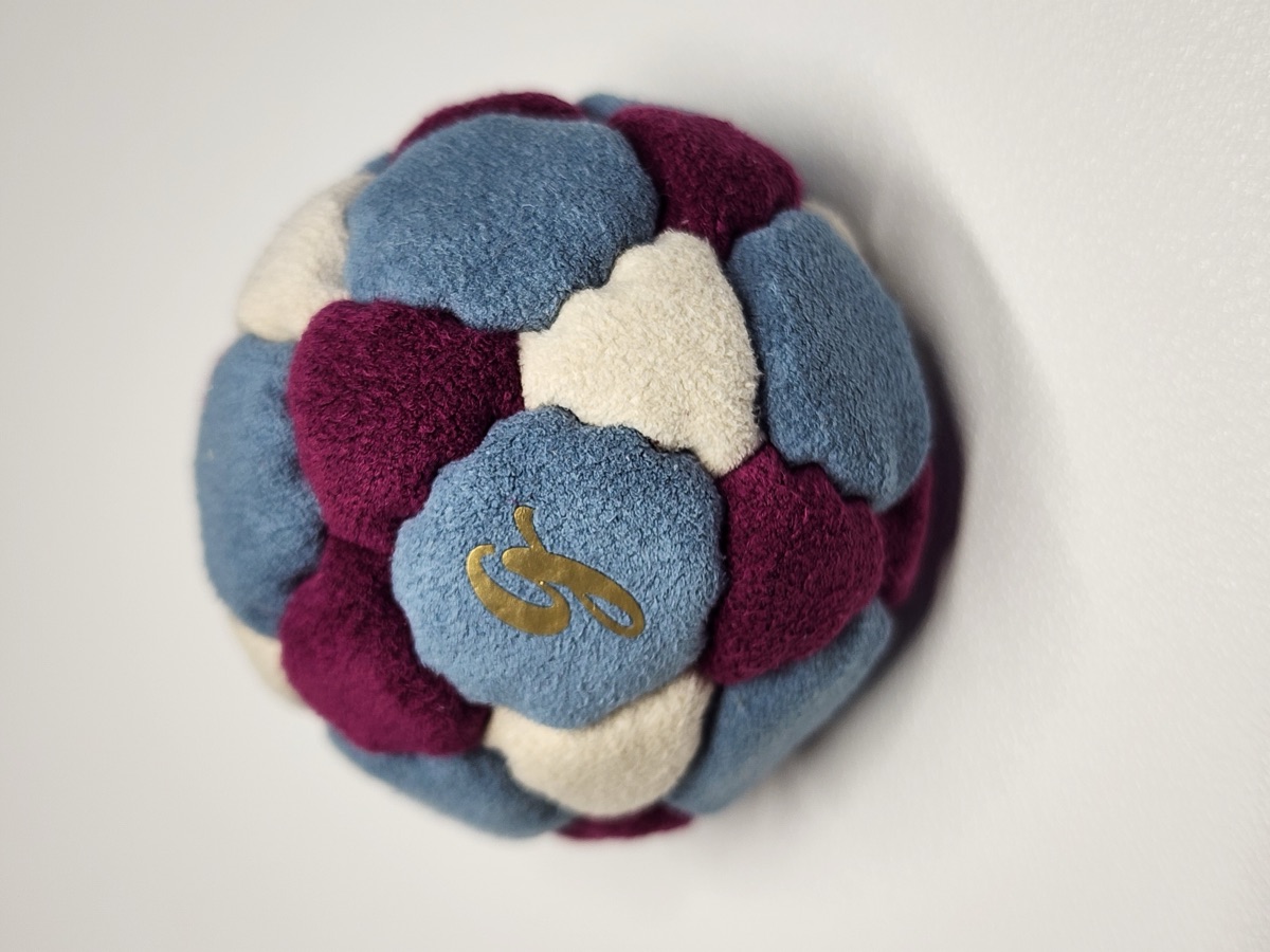 32-Panel Footbag by G (#66) — Stitched by freestyle player G. A 32-panel pro freestyle bag made from Ultrasuede LX — the gold standard fabric for freestyle footbags. 32 panels, 1.9 inch, 65g.