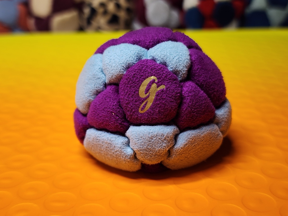 32-Panel Footbag by G (#83) — Stitched by freestyle player G. A 32-panel pro freestyle bag made from Lamous — a premium synthetic suede with a smooth, consistent feel. 32 panels, 1.9 inch, 65g.