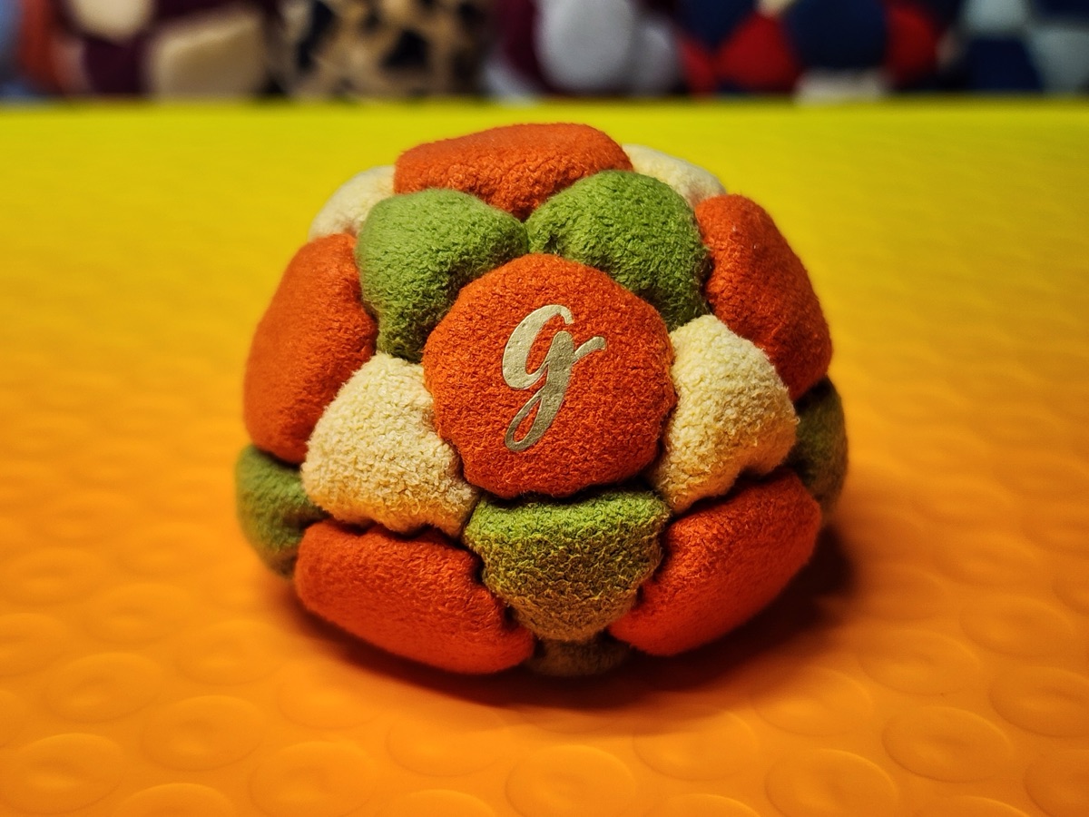 32-Panel Footbag by G (#87) — Stitched by freestyle player G. A 32-panel pro freestyle bag made from Lamous — a premium synthetic suede with a smooth, consistent feel. 32 panels, 1.9 inch, 65g.