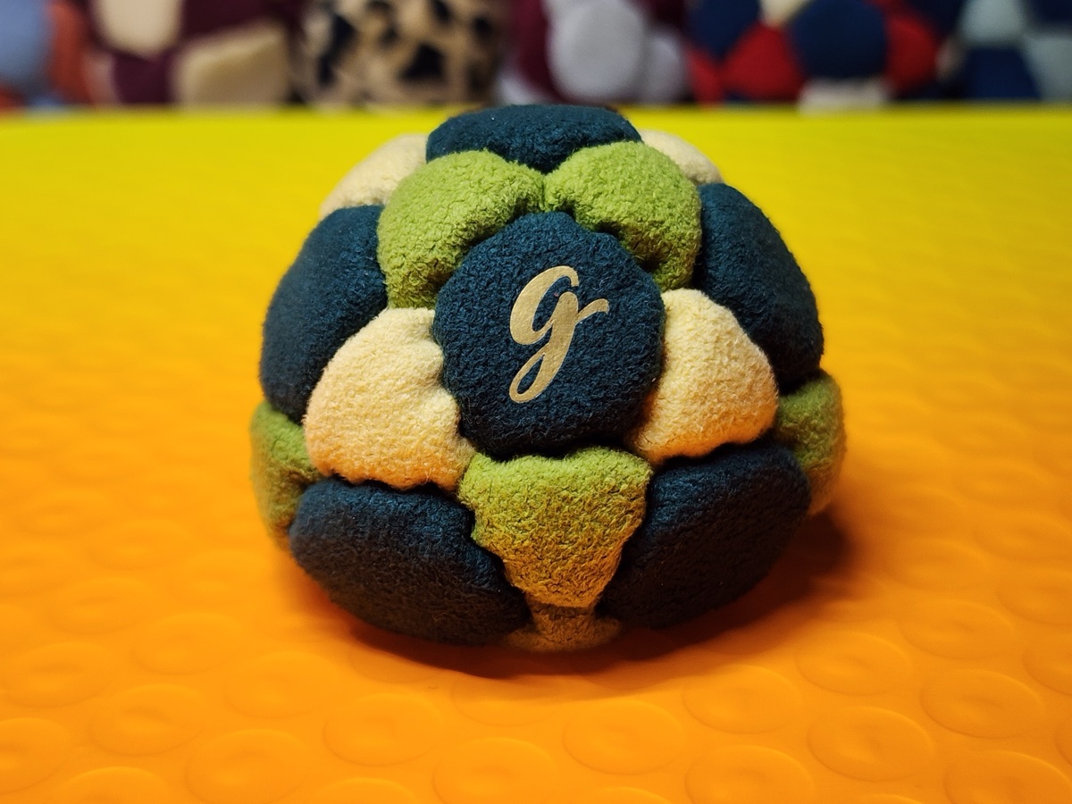 32-Panel Footbag by G (#89) — Stitched by freestyle player G. A 32-panel pro freestyle bag made from Lamous — a premium synthetic suede with a smooth, consistent feel. 32 panels, 1.9 inch, 65g.