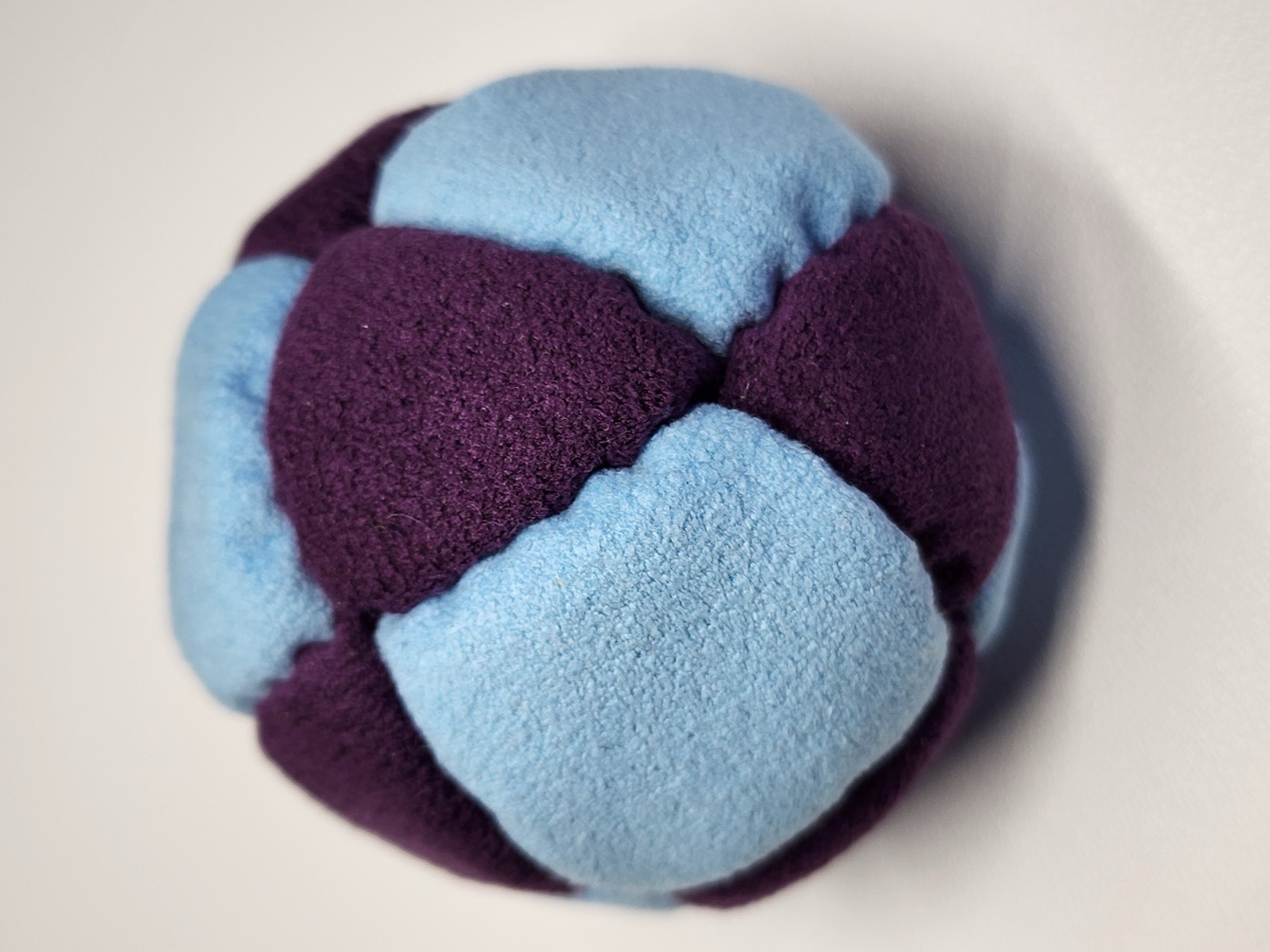 14-Panel XL Footbag by Mantis (#18) — Stitched by Nick Landes (Mantis Footbag). XL 14-panel freestyle footbag made with Ultrasuede Soft and stainless steel fill. 2.4 inch, 65g.