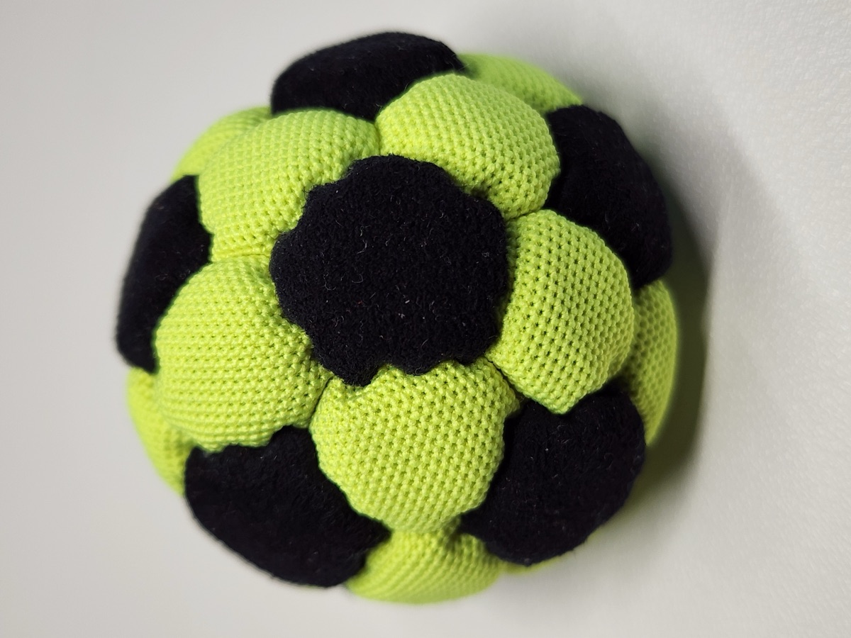 32-Panel Footbag by Mantis (#13) — Stitched by Nick Landes (Mantis Footbag). A handmade 32-panel freestyle footbag made with High Viz material and hybrid fill. 1.9 inch, 65g.