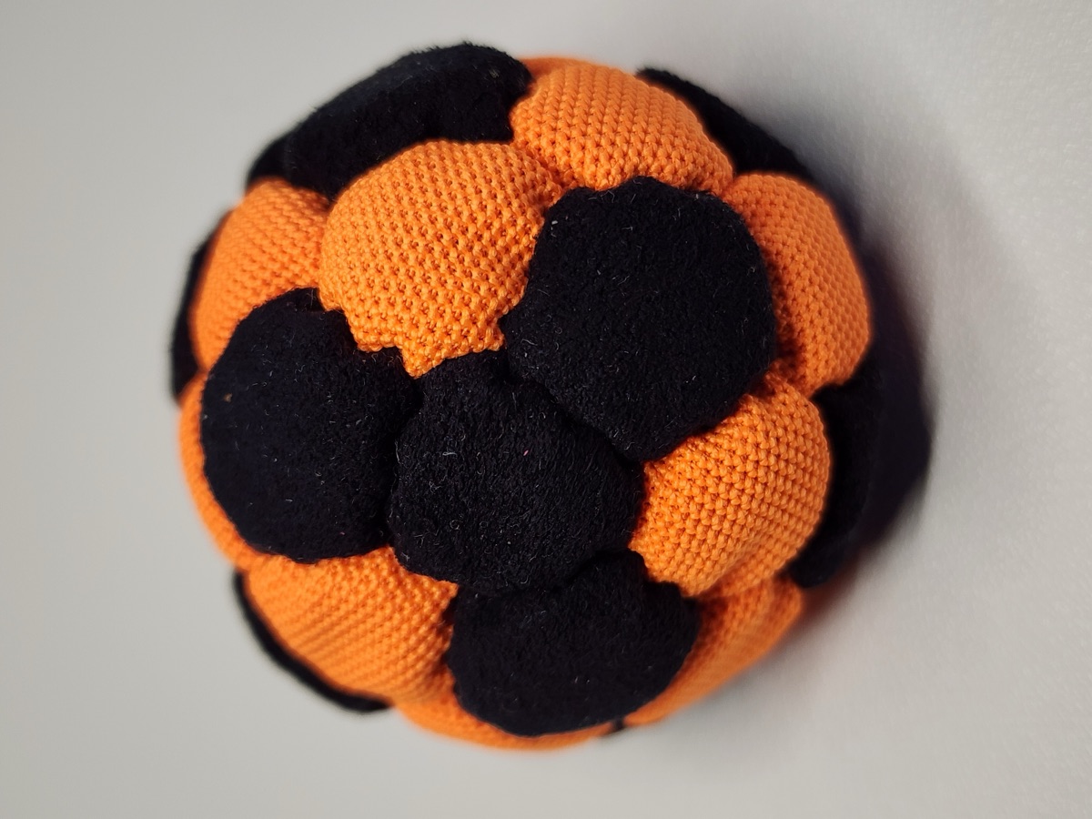 32-Panel Footbag by Mantis (#15) — Stitched by Nick Landes (Mantis Footbag). A handmade 32-panel freestyle footbag made with High Viz material and hybrid fill. 1.9 inch, 65g.